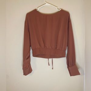 Cute top with cross-cross back